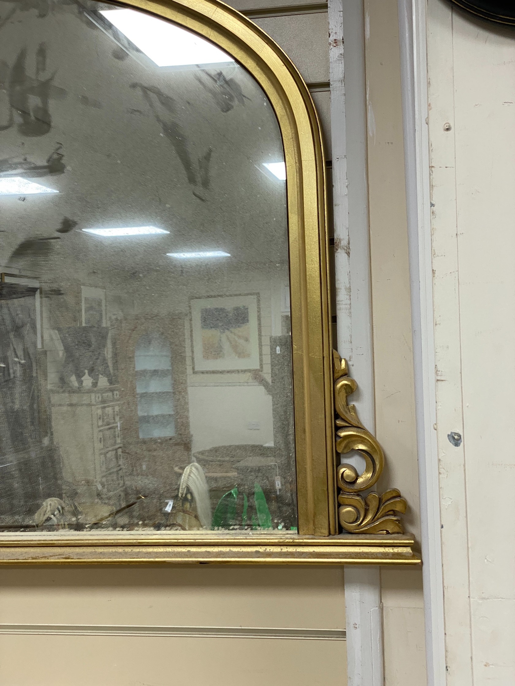 A Victorian style gilt overmantel mirror, width 128cm, height 80cm